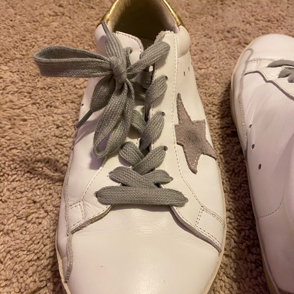 golden goose sneakers! fit a us size 10 or 9.5